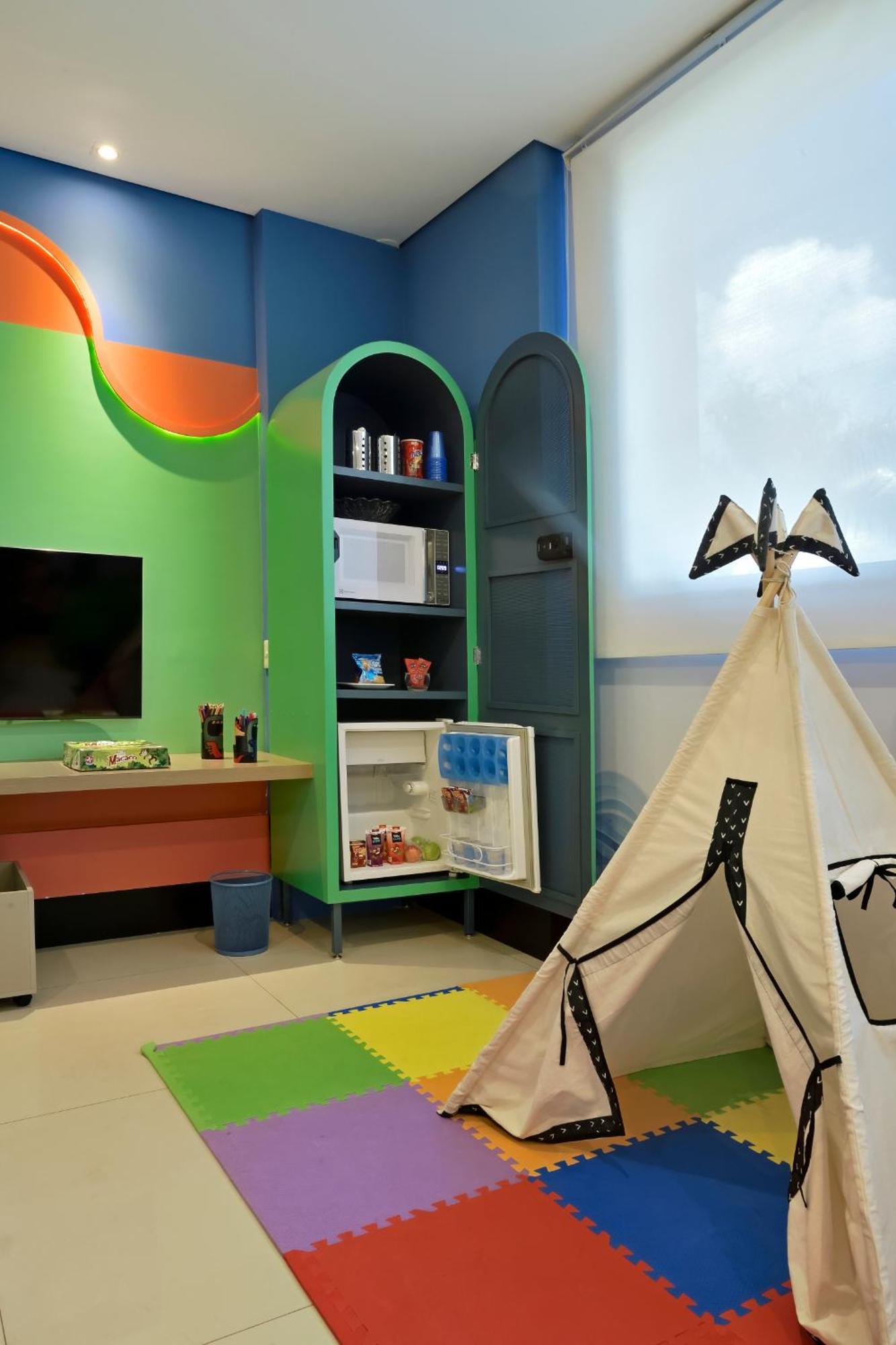 Hotel Mont Blanc Premium Ribeirão Preto Exterior foto A child's room with a mini-refrigerator
